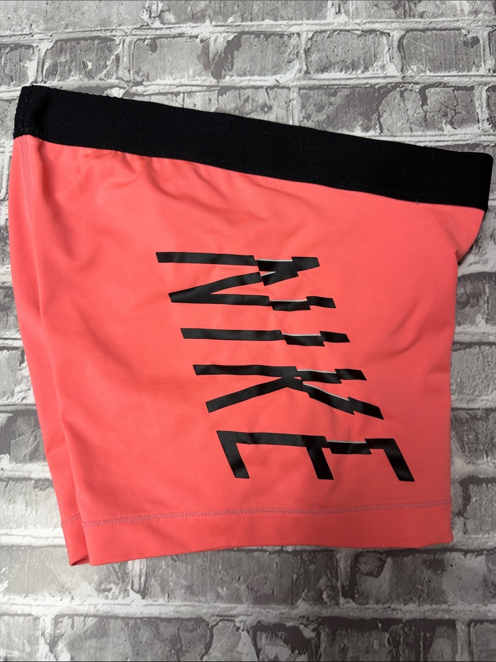 Nike Pro Coral Shorts with Black Waistband and Logo‎